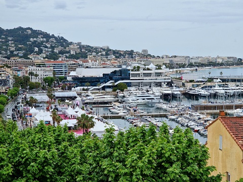 High level view of Cannes, France, Europe - port and village during 76th international Film Festival on a rainy day