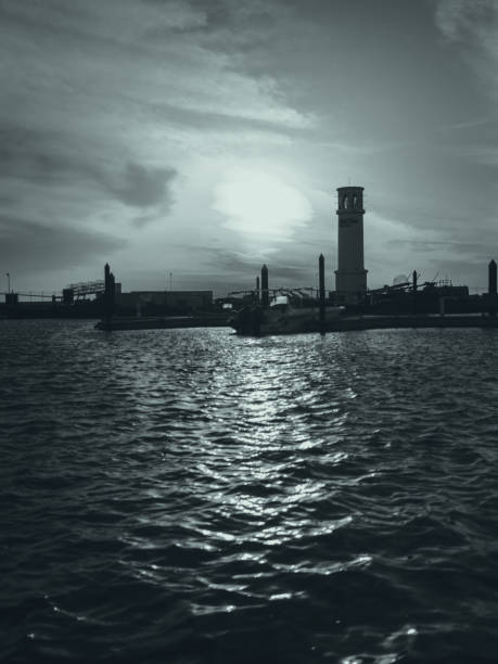 Captivating Maritime Scene: Sailboats Resting Peacefully in a Tranquil Harbor Setting