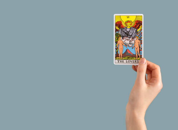 istock Lovers tarot card in hand, Banner background with copy space for text 1494029579