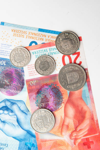 istock swiss francs currency banknotes and coins 1494030858