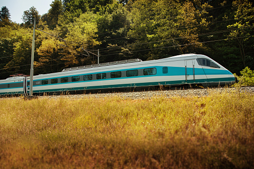 Amstetten, Germany - July 21, 2021: ICE 3 high-speed train of Deutsche Bahn on Geislinger Steige near Amstetten, Germany.