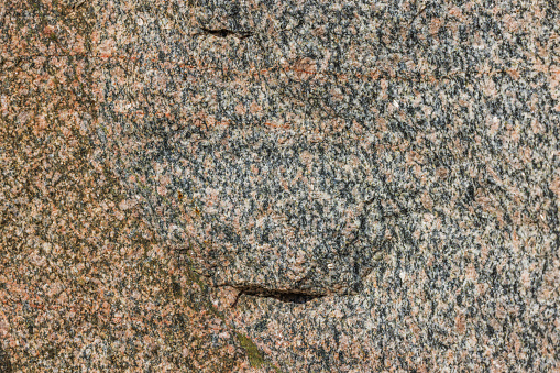 Close up view of brown-gray rock mountain texture. Beautiful nature backgrounds.