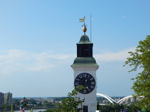 Famous tourist symbol of Novi Sad, Serbia - old historical clock tower in the ancient military fortress Petrovaradin