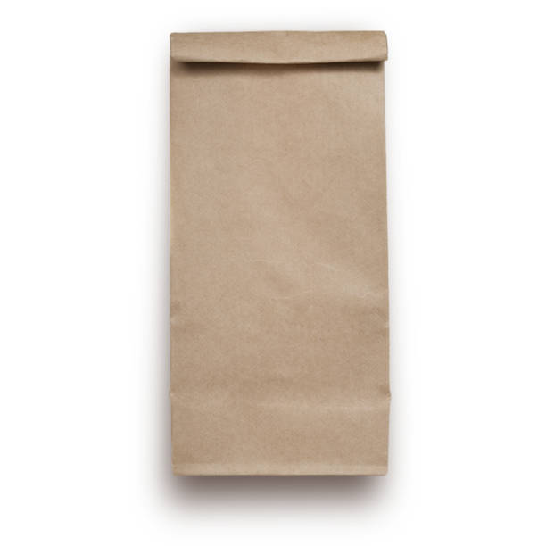 istock Classical brown paper bag isolated on white background fit for your mockup design. 1494049617