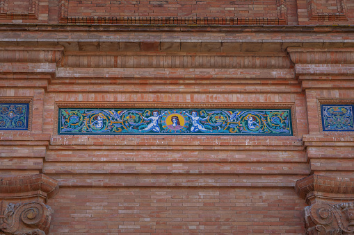 Seville, Spain - Apr 5, 2019: Decorative tiles at Plaza de Espana - Seville, Andalusia, Spain