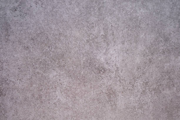 istock Close-up beautiful abstract beige marble background with dark spots. 1494066613