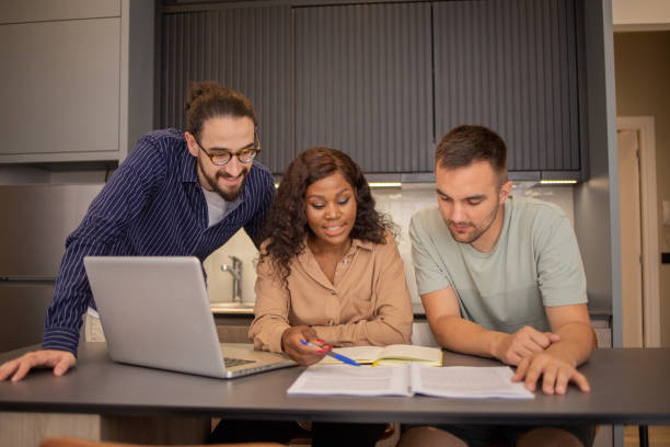 istock Diverse group of students are learning online from their dormitory 1494070004