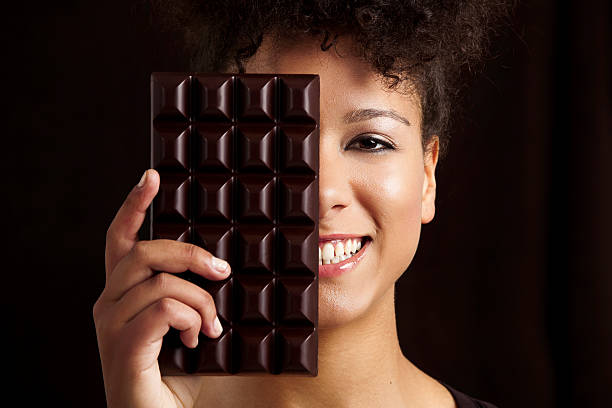 istock Woman with a chocolate bar 149407064