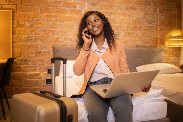 istock Businesswoman in a hotel room 1494073629