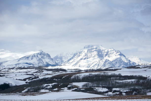 istock Scenic Point and Rising Wolf Mountain in Snowy Powder Blue 1494074142