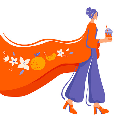 The girl with a glass of coffee goes. Woman with a glass of bubble tea. Blossoming tangerine pattern. Cold tea to go in the summer heat.