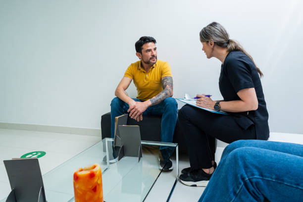 istock Beautiful doctor attends to her patient while he is lying on the stretcher 1494083738