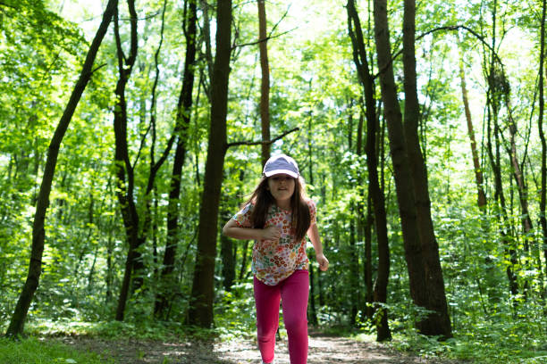 istock Young Girl in Forest 1494088780