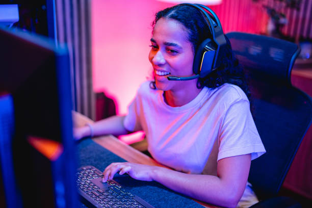 istock Young Adult Hispanic Female Gamer Playing On A Computer 1494088857