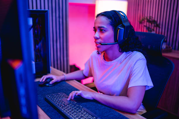 istock Young Adult Hispanic Female Gamer Playing On A Computer 1494088871