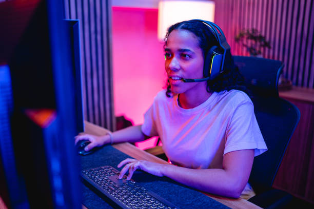 istock Young Adult Hispanic Female Gamer Playing On A Computer 1494088873