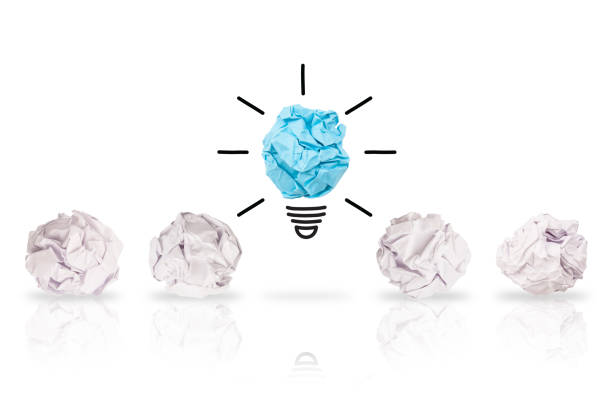 New Idea Concepts with Light Bulb Crumpled Paper on White Background