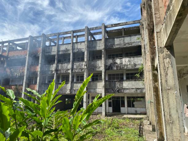 istock abandoned building, outside of abandoned school building 1494096317
