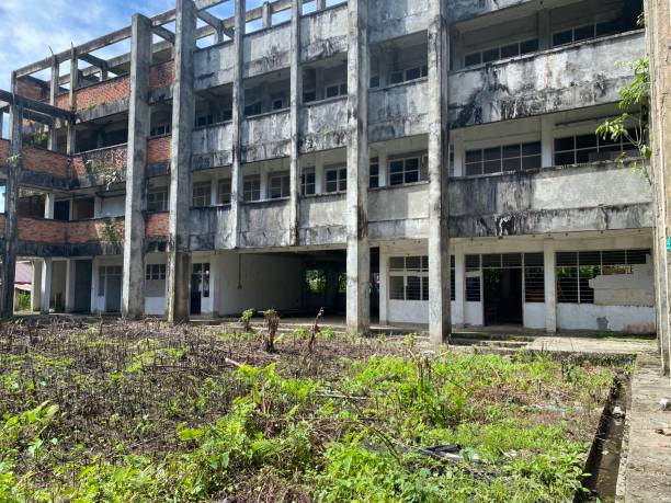 istock abandoned building, outside of abandoned school building 1494097844