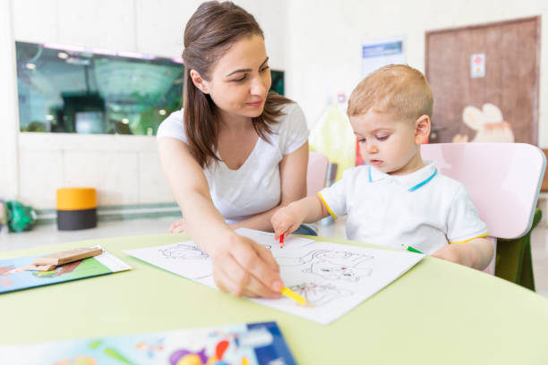 istock Mother and baby draw color pencil 1494100634