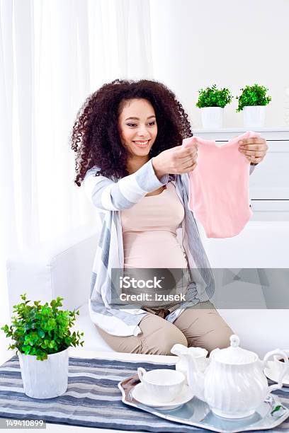Waiting For A Newborn Child Stock Photo - Download Image Now - Pregnant, Baby Clothing, Morning