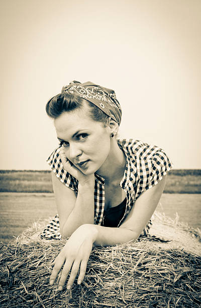 istock beautiful rockabilly girl on hay bale 149411316