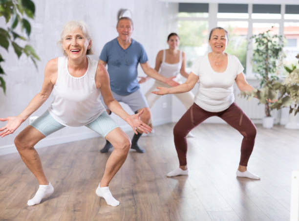 istock Group of people of different ages dancing in studio 1494114516
