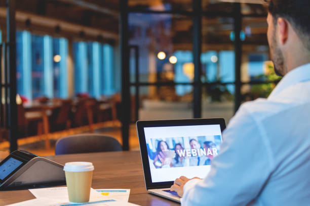 istock Businessman waiting for a webinar to begin 1494114585