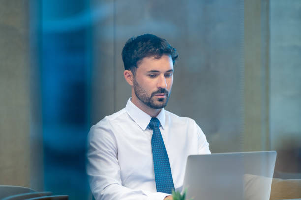 istock Business man working on a laptop computer. 1494114665