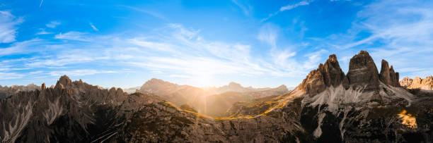 istock Sun sets in mountains behind Tre Cime di Lavaredo silhouette 1494124158