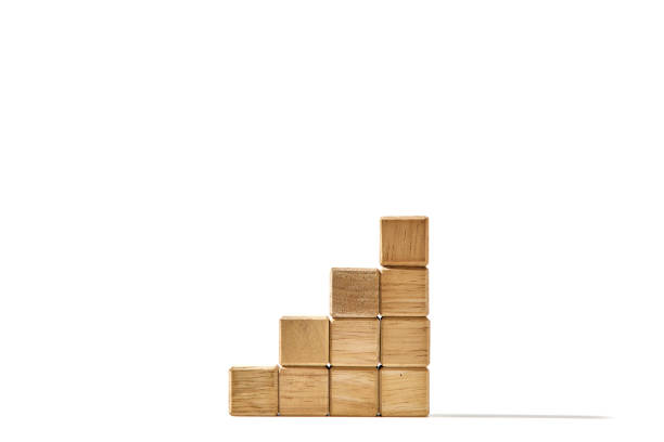 istock Wood cube arranged stacked as stair step shapes, a business concept 1494124628