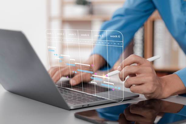 istock Businessman managing KPI dashboard table and connecting to database Financial organization strategy. Management of planning software on interface screen. 1494129987