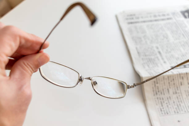 istock holding glasses in one hand 1494134688