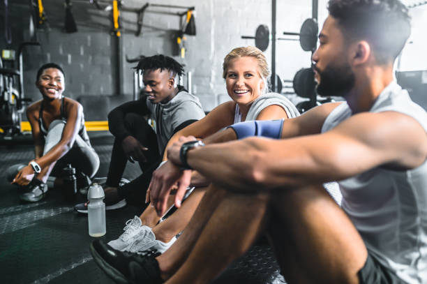 istock Group of friends taking break in gym 1494134829
