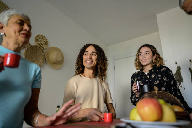istock Family drinking coffee and making video call 1494137657
