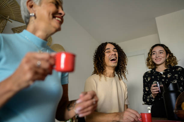 istock Family drinking coffee and making video call 1494137957