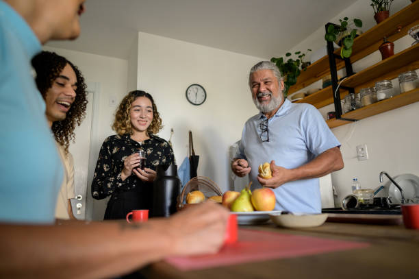 istock Family drinking coffee and making video call 1494137964