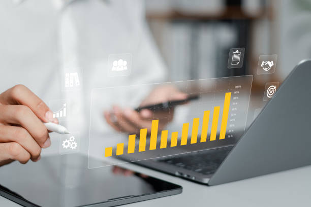 istock Businessman analyze sales data and economic growth graphs to plan long-term investment strategies. Digital online marketing concept. 1494139361