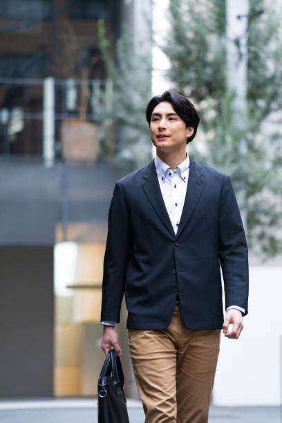 istock Japanese man in suit going to work 1494139684