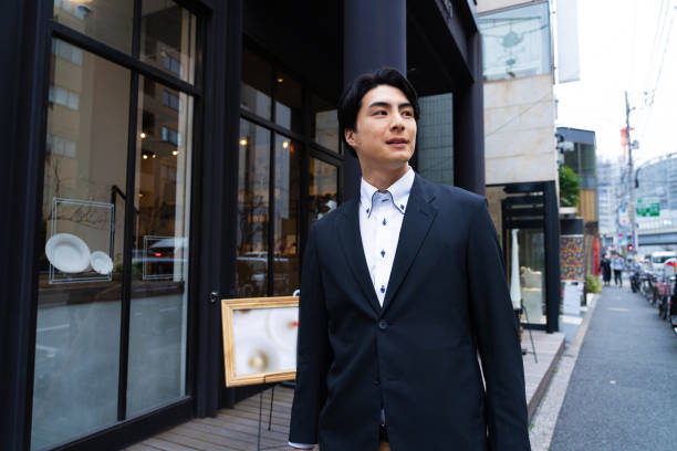 istock Japanese man in suit going to work 1494139874