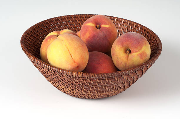 Peaches in a Basket stock photo