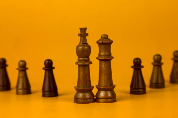 istock 8 pieaces Realistic queen on bright yellow background with copy space. Chess piece. Minimal creative battle concept. 3d render 3d illustration 1494141272
