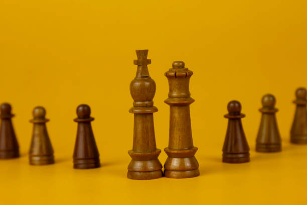 istock Eight pieaces Realistic queen on bright yellow background with copy space. Chess piece. Minimal creative battle concept. 3d render 3d illustration 1494141385