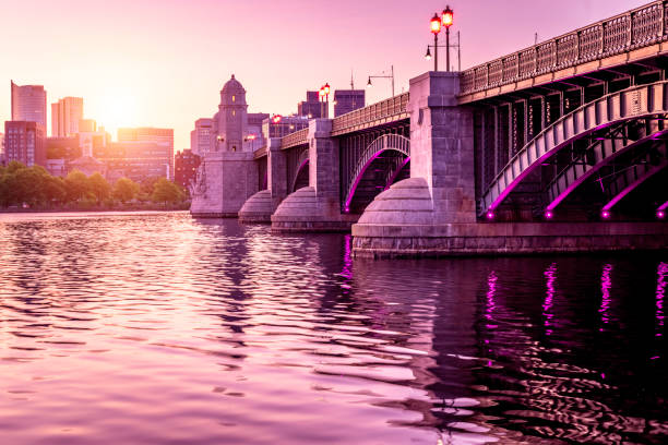 Boston in Massachusetts, USA The skyline of Boston in Massachusetts, USA at sunrise at Back Bay with its famous Longfellow Bridge and The Charles river. boston prudential building stock pictures, royalty-free photos & images