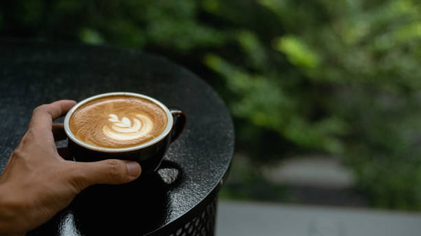istock Glass of coffee on the table 1494144173