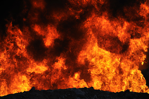 industrial background of a wall of flame