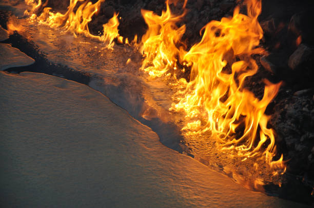 flames on the surface of an oily pond