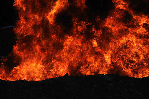 industrial background of a wall of flame