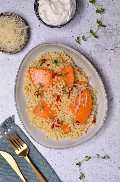 istock Pasta with fried pumpkin slices 1494147078