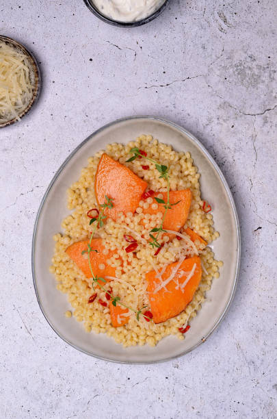 istock Pasta with fried pumpkin slices 1494147137